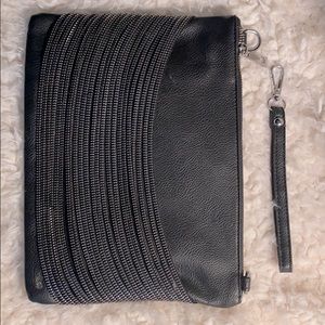 Faux leather clutch with metal clutch detail